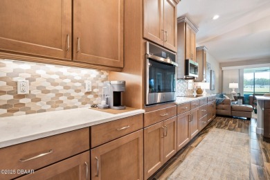 This breathtaking lakefront estate in Plantation Bay perfectly on Plantation Bay Golf and Country Club in Florida - for sale on GolfHomes.com, golf home, golf lot
