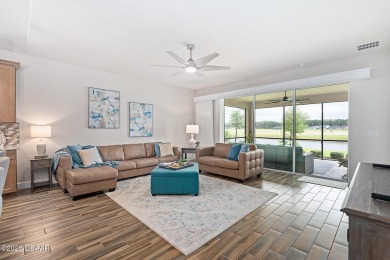 This breathtaking lakefront estate in Plantation Bay perfectly on Plantation Bay Golf and Country Club in Florida - for sale on GolfHomes.com, golf home, golf lot