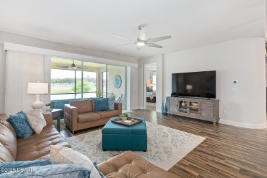 This breathtaking lakefront estate in Plantation Bay perfectly on Plantation Bay Golf and Country Club in Florida - for sale on GolfHomes.com, golf home, golf lot