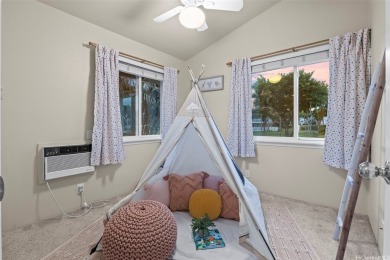 FORE! This large and bright 4-bed, 2.5 bath home situated right on Waikele Golf Club in Hawaii - for sale on GolfHomes.com, golf home, golf lot