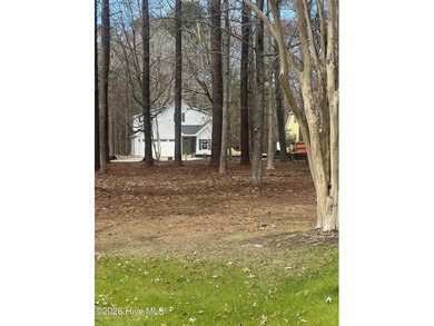 Corner wooded lot with mature trees offering privacy in a gated on Sound Golf Links at Albemarle Plantation in North Carolina - for sale on GolfHomes.com, golf home, golf lot