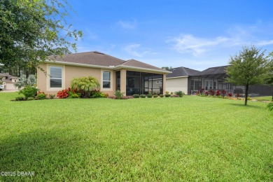 This breathtaking lakefront estate in Plantation Bay perfectly on Plantation Bay Golf and Country Club in Florida - for sale on GolfHomes.com, golf home, golf lot