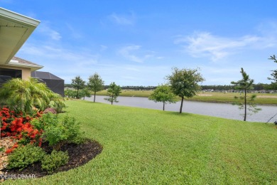 This breathtaking lakefront estate in Plantation Bay perfectly on Plantation Bay Golf and Country Club in Florida - for sale on GolfHomes.com, golf home, golf lot