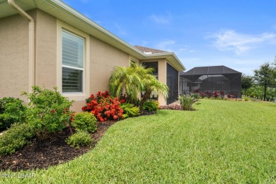 This breathtaking lakefront estate in Plantation Bay perfectly on Plantation Bay Golf and Country Club in Florida - for sale on GolfHomes.com, golf home, golf lot