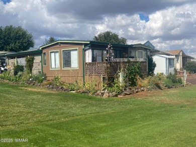 This spacious home is located on the golf course surrounded on on Juniper Ridge R.V. Golf Resort in Arizona - for sale on GolfHomes.com, golf home, golf lot