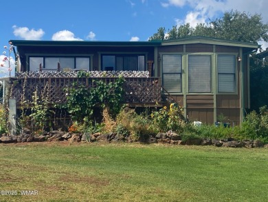 This spacious home is located on the golf course surrounded on on Juniper Ridge R.V. Golf Resort in Arizona - for sale on GolfHomes.com, golf home, golf lot