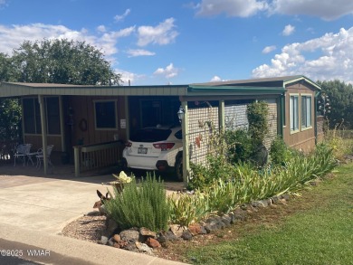 This spacious home is located on the golf course surrounded on on Juniper Ridge R.V. Golf Resort in Arizona - for sale on GolfHomes.com, golf home, golf lot