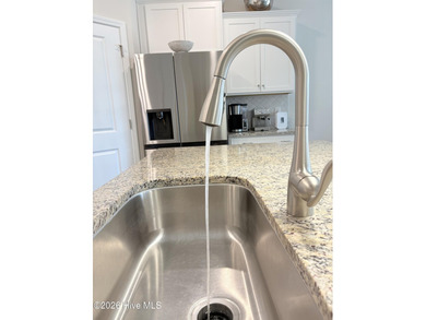 Welcome to 1117 Treyburn Court located on quiet cul-de-sac on Brunswick Plantation and Golf Resorts in North Carolina - for sale on GolfHomes.com, golf home, golf lot