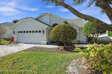 This maintenance-free 3/2/2 villa with pool in Glen Lakes Golf & on Glen Lakes Country Club in Florida - for sale on GolfHomes.com, golf home, golf lot