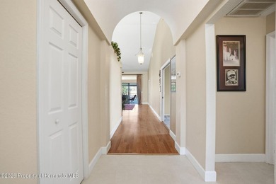 This maintenance-free 3/2/2 villa with pool in Glen Lakes Golf & on Glen Lakes Country Club in Florida - for sale on GolfHomes.com, golf home, golf lot