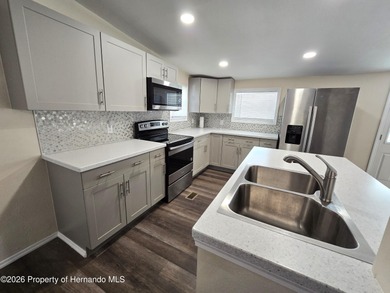 Enjoy Florida living in this 3-bedroom, 2-bath home on a on High Point Golf Club, Inc. in Florida - for sale on GolfHomes.com, golf home, golf lot