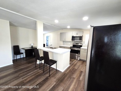 Enjoy Florida living in this 3-bedroom, 2-bath home on a on High Point Golf Club, Inc. in Florida - for sale on GolfHomes.com, golf home, golf lot