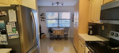 MUST SEE! Beautifully remodeled 1,250 sq ft 2nd floor 2/2 condo on Sunrise Lakes Phase IV Golf Course in Florida - for sale on GolfHomes.com, golf home, golf lot