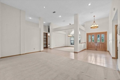 Welcome to Hearthstone on Forest Club, a timeless retreat where on Walden Lake Golf and Country Club  in Florida - for sale on GolfHomes.com, golf home, golf lot