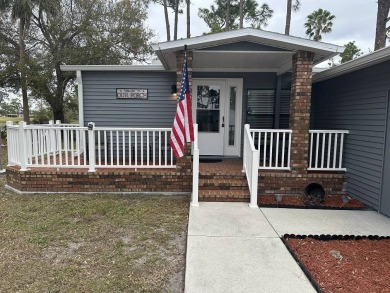 The Lot Rent for this home is $1,742.00/monthly.   This on Pine Lakes Country Club in Florida - for sale on GolfHomes.com, golf home, golf lot