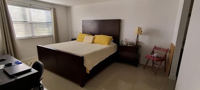 MUST SEE! Beautifully remodeled 1,250 sq ft 2nd floor 2/2 condo on Sunrise Lakes Phase IV Golf Course in Florida - for sale on GolfHomes.com, golf home, golf lot