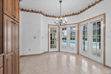 Welcome to Hearthstone on Forest Club, a timeless retreat where on Walden Lake Golf and Country Club  in Florida - for sale on GolfHomes.com, golf home, golf lot