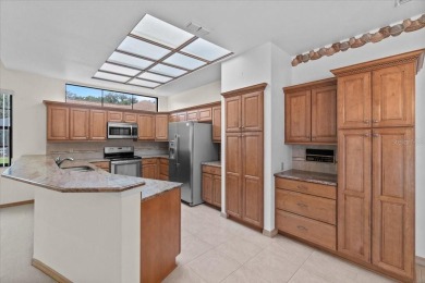 Welcome to Hearthstone on Forest Club, a timeless retreat where on Walden Lake Golf and Country Club  in Florida - for sale on GolfHomes.com, golf home, golf lot