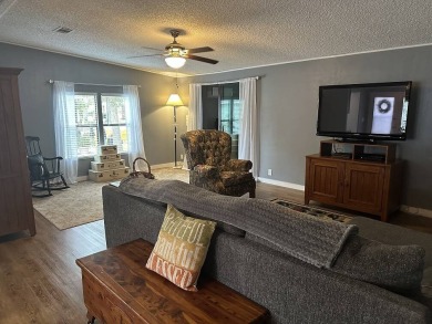The Lot Rent for this home is $1,742.00/monthly.   This on Pine Lakes Country Club in Florida - for sale on GolfHomes.com, golf home, golf lot