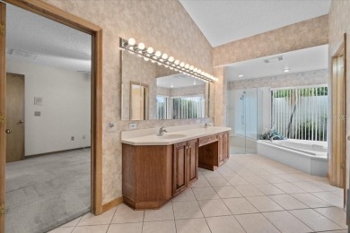 Welcome to Hearthstone on Forest Club, a timeless retreat where on Walden Lake Golf and Country Club  in Florida - for sale on GolfHomes.com, golf home, golf lot