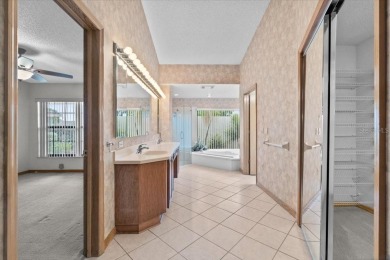 Welcome to Hearthstone on Forest Club, a timeless retreat where on Walden Lake Golf and Country Club  in Florida - for sale on GolfHomes.com, golf home, golf lot