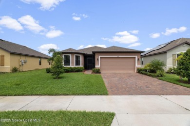 Welcome to this stunning 2022-built home in The Preserves at on Majors Golf Club At Bayside Lakes in Florida - for sale on GolfHomes.com, golf home, golf lot
