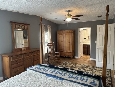 The Lot Rent for this home is $1,742.00/monthly.   This on Pine Lakes Country Club in Florida - for sale on GolfHomes.com, golf home, golf lot