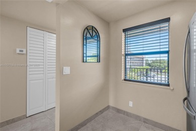 ENJOY A VIEW OF GOLF COURSE AND WATER FOR YOUR FUTURE HOME on Sunrise Lakes Phase IV Golf Course in Florida - for sale on GolfHomes.com, golf home, golf lot