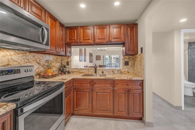 ENJOY A VIEW OF GOLF COURSE AND WATER FOR YOUR FUTURE HOME on Sunrise Lakes Phase IV Golf Course in Florida - for sale on GolfHomes.com, golf home, golf lot