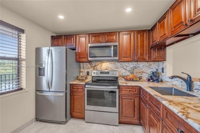 ENJOY A VIEW OF GOLF COURSE AND WATER FOR YOUR FUTURE HOME on Sunrise Lakes Phase IV Golf Course in Florida - for sale on GolfHomes.com, golf home, golf lot