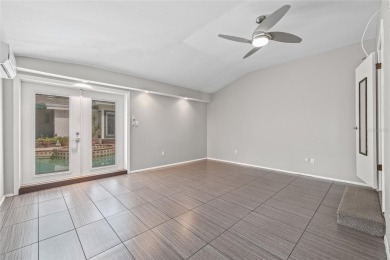 A must-see mid-century modern beauty with European flair located on The Renaisssance Vinoy Golf Club in Florida - for sale on GolfHomes.com, golf home, golf lot