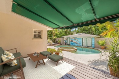 A must-see mid-century modern beauty with European flair located on The Renaisssance Vinoy Golf Club in Florida - for sale on GolfHomes.com, golf home, golf lot