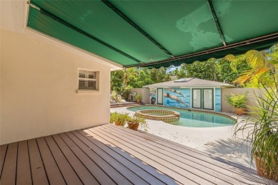 A must-see mid-century modern beauty with European flair located on The Renaisssance Vinoy Golf Club in Florida - for sale on GolfHomes.com, golf home, golf lot