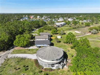 Welcome to your safe getaway on the Coast! Enjoy coastal living on Pass Christian Isles Golf Club in Mississippi - for sale on GolfHomes.com, golf home, golf lot