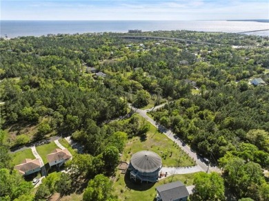 Welcome to your safe getaway on the Coast! Enjoy coastal living on Pass Christian Isles Golf Club in Mississippi - for sale on GolfHomes.com, golf home, golf lot