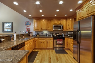 Situated on the 7th tee of Pinetop Lakes Country Club in the on Pinetop Lakes Golf and Country Club in Arizona - for sale on GolfHomes.com, golf home, golf lot