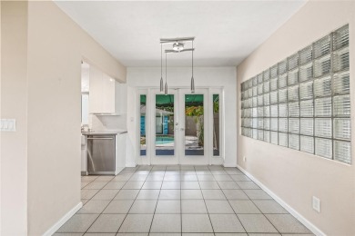 A must-see mid-century modern beauty with European flair located on The Renaisssance Vinoy Golf Club in Florida - for sale on GolfHomes.com, golf home, golf lot