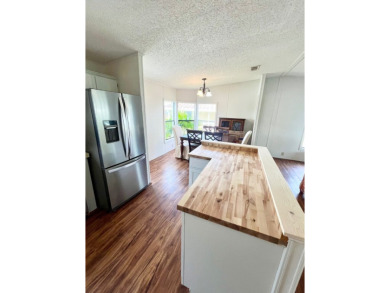 This 2-bedroom, 2-bathroom home is ready for new owners! on Lake Fairways Country Club in Florida - for sale on GolfHomes.com, golf home, golf lot