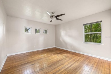 A must-see mid-century modern beauty with European flair located on The Renaisssance Vinoy Golf Club in Florida - for sale on GolfHomes.com, golf home, golf lot