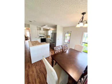 This 2-bedroom, 2-bathroom home is ready for new owners! on Lake Fairways Country Club in Florida - for sale on GolfHomes.com, golf home, golf lot
