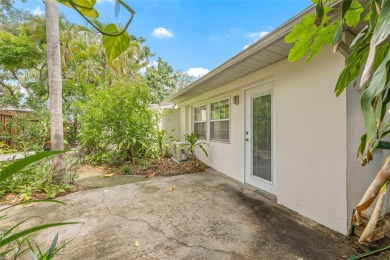 A must-see mid-century modern beauty with European flair located on The Renaisssance Vinoy Golf Club in Florida - for sale on GolfHomes.com, golf home, golf lot