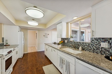 Stunning Golf Course home in Sun City! Discover this beautifully on Sun City Lakes West and East in Arizona - for sale on GolfHomes.com, golf home, golf lot