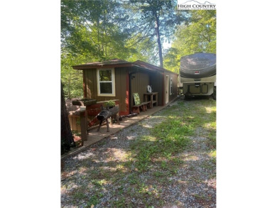 Bring your RV to this charming mountain retreat in Linvile Land on Land Harbor Golf Course in North Carolina - for sale on GolfHomes.com, golf home, golf lot