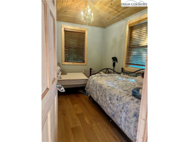 Bring your RV to this charming mountain retreat in Linvile Land on Land Harbor Golf Course in North Carolina - for sale on GolfHomes.com, golf home, golf lot
