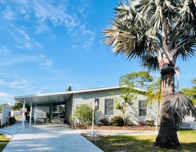 Enjoy water views from this beautiful 2-bedroom, 2-bathroom home on Lake Fairways Country Club in Florida - for sale on GolfHomes.com, golf home, golf lot