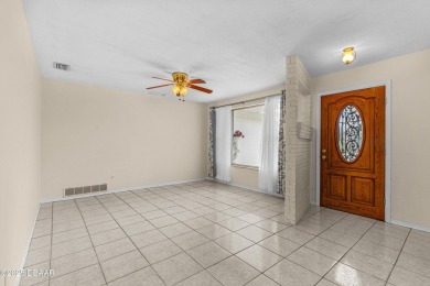 THIS HOUSE DID NOT FLOOD! This 3 bedroom, 2 bath, concrete block on Daytona Beach Golf Club in Florida - for sale on GolfHomes.com, golf home, golf lot