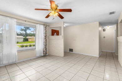 THIS HOUSE DID NOT FLOOD! This 3 bedroom, 2 bath, concrete block on Daytona Beach Golf Club in Florida - for sale on GolfHomes.com, golf home, golf lot