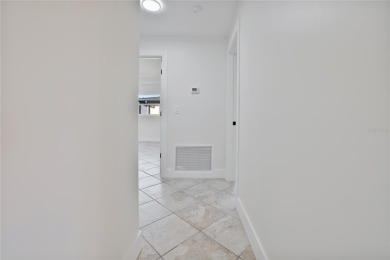 Under contract-accepting backup offers. Stunning Pool Home with on Rotonda Golf and Country Club The Hills Course in Florida - for sale on GolfHomes.com, golf home, golf lot
