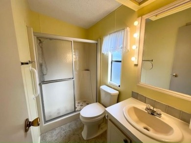 PRICE REDUCTION! Well-cared for 2-bd 2-ba home, located on a on Del Tura Golf and Country Club in Florida - for sale on GolfHomes.com, golf home, golf lot