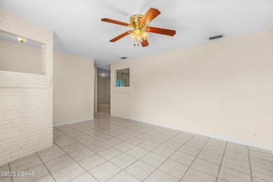 THIS HOUSE DID NOT FLOOD! This 3 bedroom, 2 bath, concrete block on Daytona Beach Golf Club in Florida - for sale on GolfHomes.com, golf home, golf lot